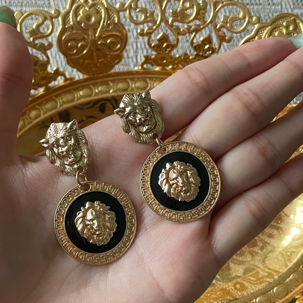 Gold Leon round mishka earrings